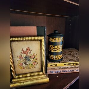 Medium-sized hand painted glass canister.